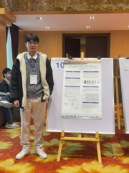 A person standing next to a white board

Description automatically generated