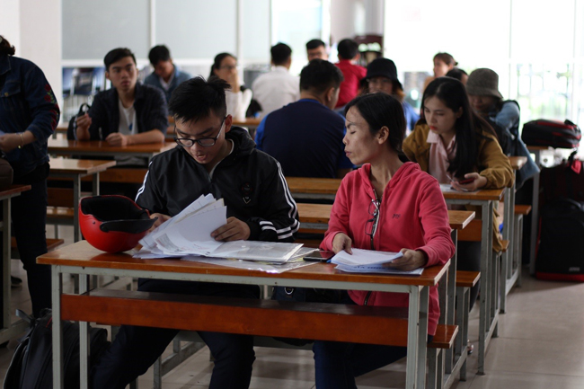 An incoming student and his mother completed his enrollment profile